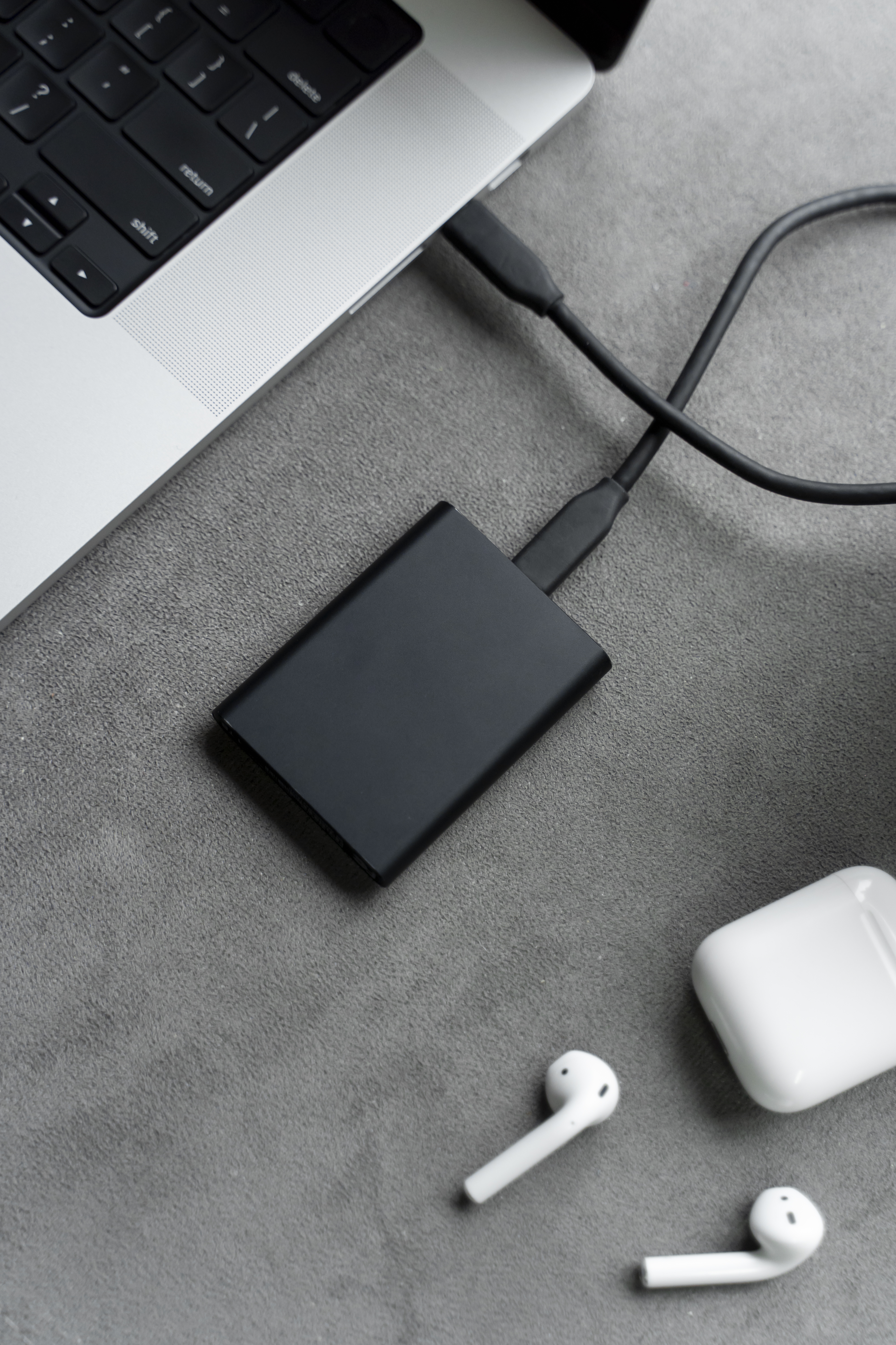 Close-up of a USB Wi-Fi adapter with detachable antenna